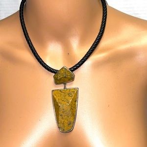 LEATHER NECKLACE ​​COLOR BROWN WITH BEIGE STONE PENDANT PREHISTORIC DESIGN